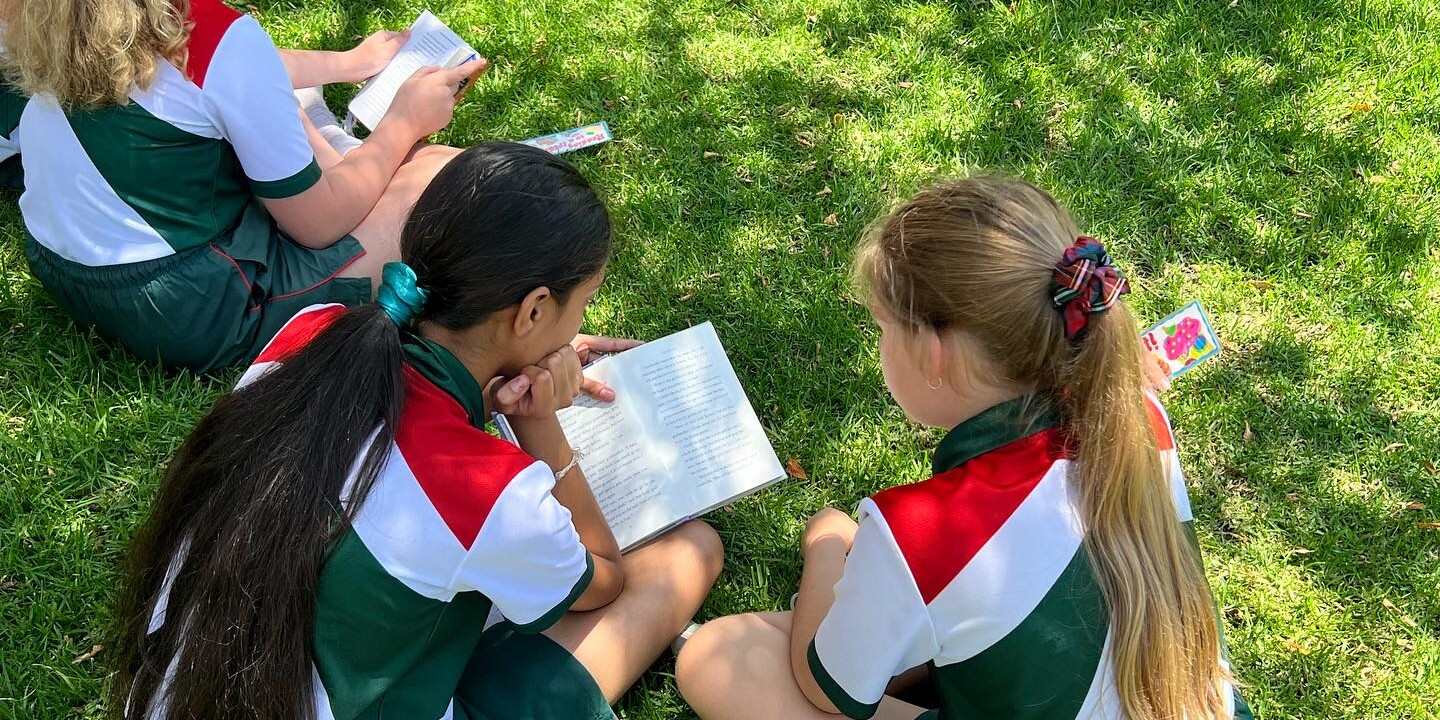 Two Girls reading